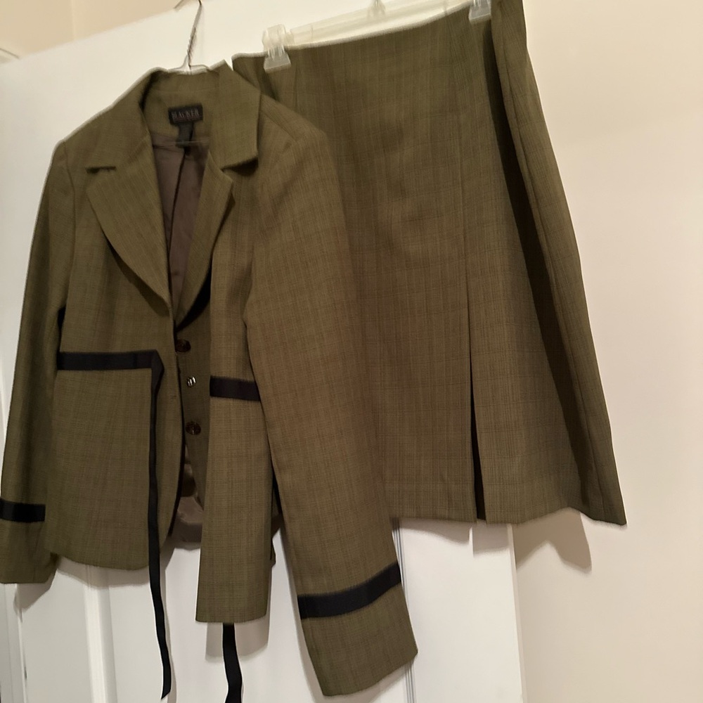 Green jacket with fancy buttons and skirt set.  Never worn